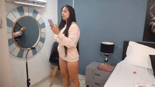 Beautiful Latina creates content for her social media