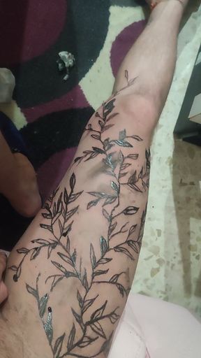 Tattooing his cock