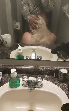 Mirror blowjob in the bathroom