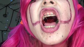 Evil Sexy Clown Swallows Hundreds of Gummy Bears!!