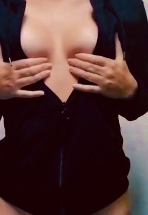 Adorable solo babe shows off her tits