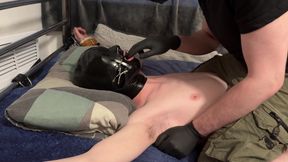 Twink Being Edged with E-stim While Getting His Throat Fingered