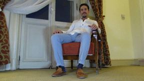 Gio wearing blue sheer socks and loafers