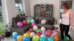 stomping 12inch balloons with Birkenstock shoe