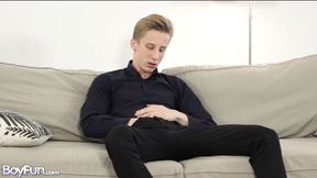Lukas Pryde is stroking hard dick on a couch