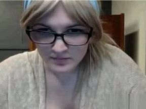 Nerdy babe flashes her tits in library