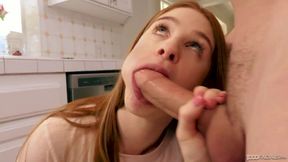 Beautiful redhead teen Scarlett Snow knows how to suck a fat dong