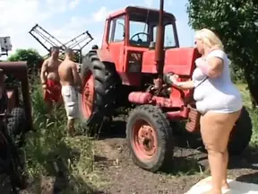 Large white lady gives a deepthroat blowjob to a hard cock at the sex party.