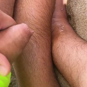 Pissing and cumming on beach