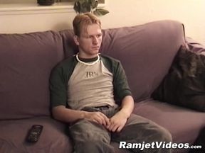 Handsome dude shoots cum after wanking off his cock