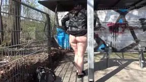 Curvy Babe Pisses Wide Open in Public Garage