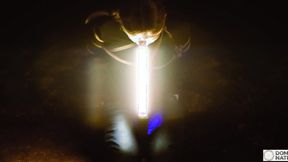 ”Deepthroating light wand, gagging on shaft under the stars”