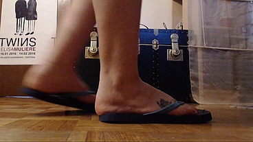 Flip flops and sweaty feet for an Italian woman