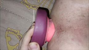 A dildo with a huge knot goes completely into my ass