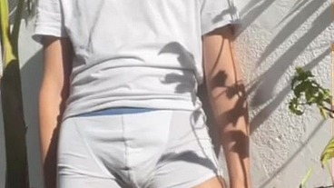 Twink self-pissing - wetting in white undies - male omorashi