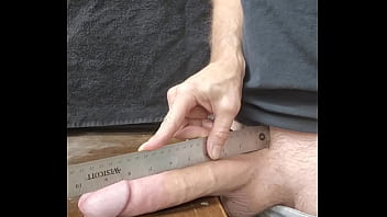 Measuring big white cock