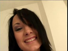 Slender brunette with a pierced tongue sucks the cameraman's cock