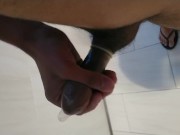 Jacking off into condom in hotel toilet
