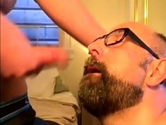 Bearded guy takes two loads to the face from his buddy