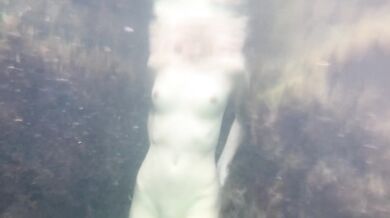 Naked Russian girl fucks herself raw in the sea POV