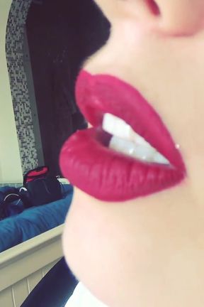 Smoke from dark red big lips