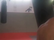 Boxing the heavy bag. Real-life bad boy and straight porn actor working out.