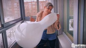 C132 Stasia smokes and btp's two Longnecks on a balcony -1080p