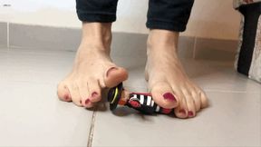 FOOT PLAYING WITH SMALL DOLL - MP4 Mobile Version