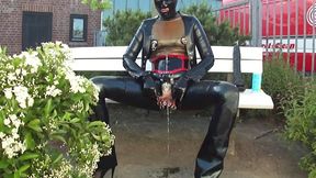 Pierced Plugged Latex Doll Masturbate Monster Rubber Dildo and Pee in Black Jeans Corset Mask Blouse and Gloves Stretched Nipples in Public P2
