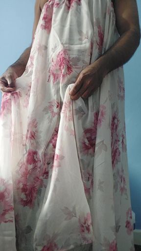 I'm masterbating in a flowery flowing silky seethrough fleard skirt and cum