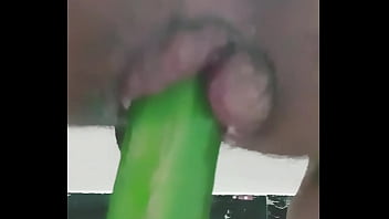 Sissy stuffed a large cucumber in her tight asshole