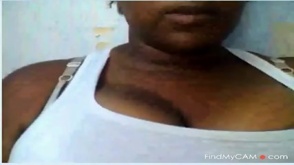 Ebony shows big tits on webcam