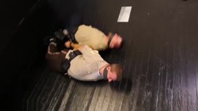 2 beefy cops bound gagged and struggling.