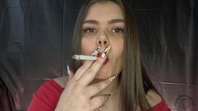 Latina Smokes and Holds the Smoke in Before Exhaling