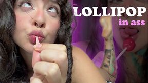 Girl with split tongue licks a lollipop and puts in ass