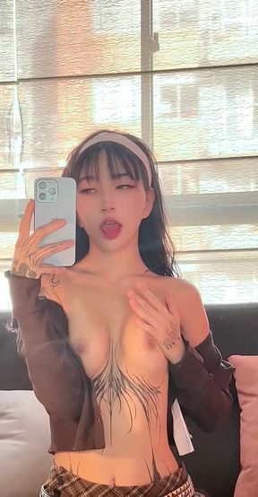 Big-titted onlyfan shows off her ass