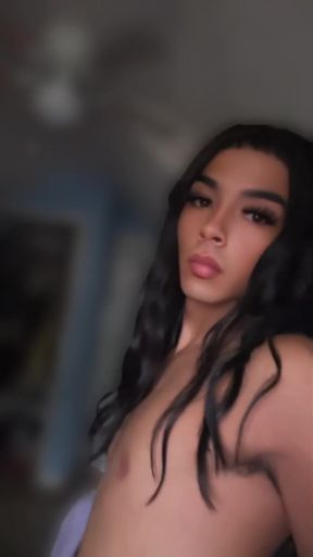 Trans petite teen shows off her ass