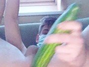 Boy fucks his ass with cucumber