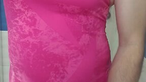 Boy in pink one piece swimsuit ejaculates