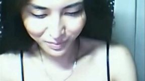 Beautiful lady-boy with big boobs and hard cock is jerking off on camera
