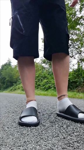 In Slippers and White Socks in Nature