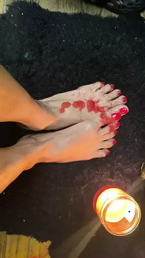 Really nice tiny feet with red long toes with candle wax