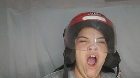 Tired yawn on a motorcycle helmet