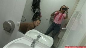 Two girls together in toilet