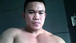 Large Asian Man Talking