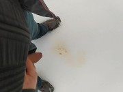 Pee on snow outdoor