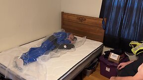 Dec 4 2022 – breath and control in slvrbrboy1s blue pvc coveralls, vacuum sealed with my pvc overall. bdsm bondage