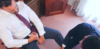 Clothed men fuck in a hotel room until the sperm begins to flow on their lips