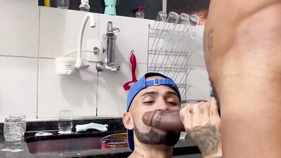 Tattooed Latino benda in the kitchen and bega for mate's BBC