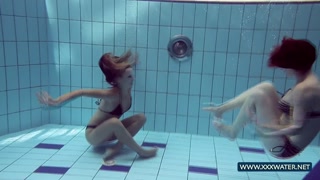 Katrin and Lucy big tits underwater